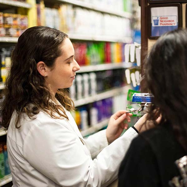 Woman checking eyeglass